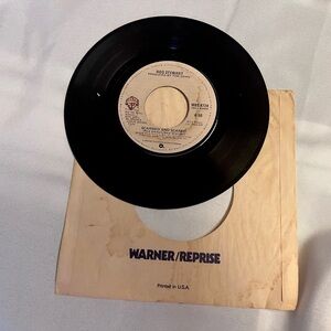 Warner Bros. Black Vinyl Record with Beige Label